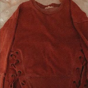 A dark pink sweatshirt